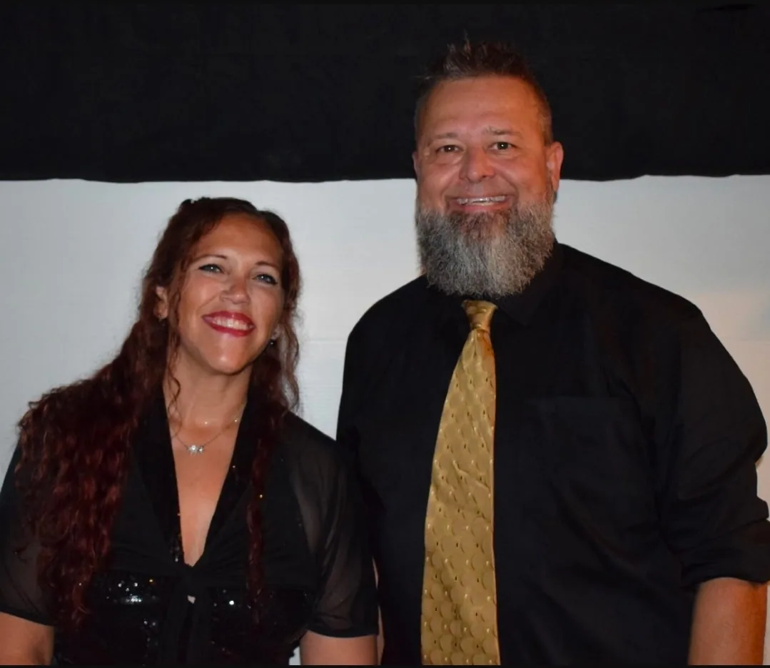 Ashley and Chris of ChrAsh Entertainment posing together